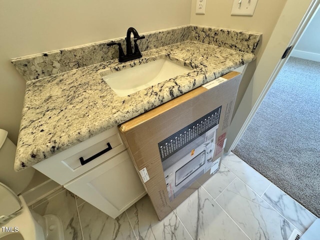 27 Batten Hill Ln, Selma, NC 27576 - bathroom with marble finish floors and vanity
