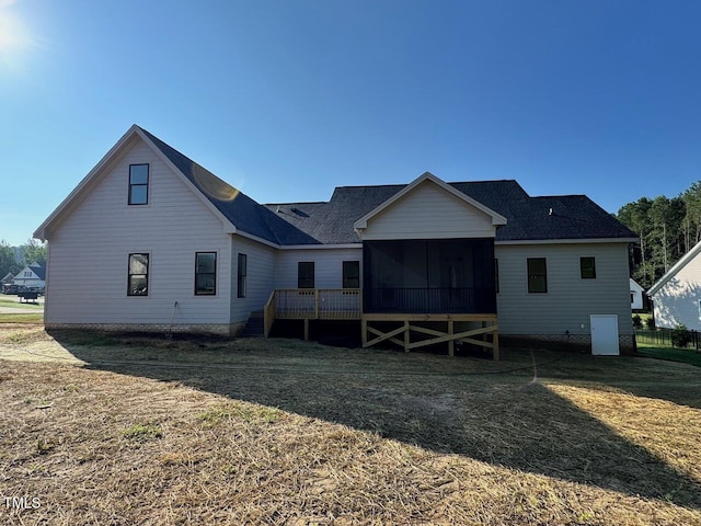 27 Batten Hill Ln, Selma, NC 27576 - rear view of house featuring a sunroom and a yard