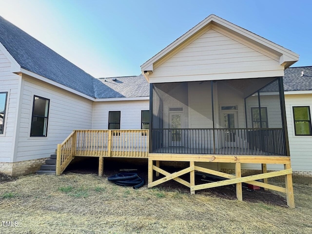 27 Batten Hill Ln, Selma, NC 27576 - rear view of house featuring a sunroom, a shingled roof, a deck, and stairway