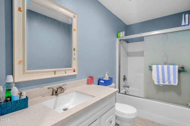 full bathroom with toilet, shower / bath combination with glass door, and vanity