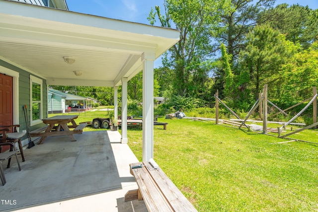 view of yard featuring covered porch