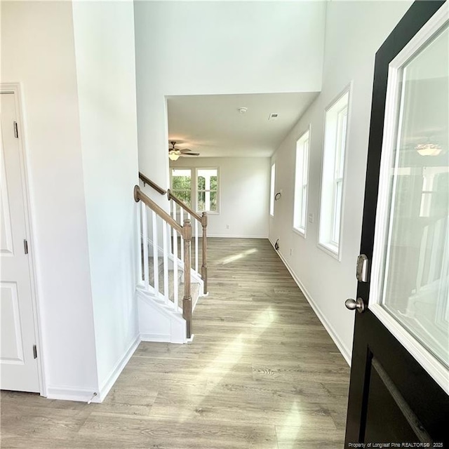 132 Cahill, Home, Raeford, NC 28376 - entryway with stairs, wood finished floors, baseboards, and a ceiling fan