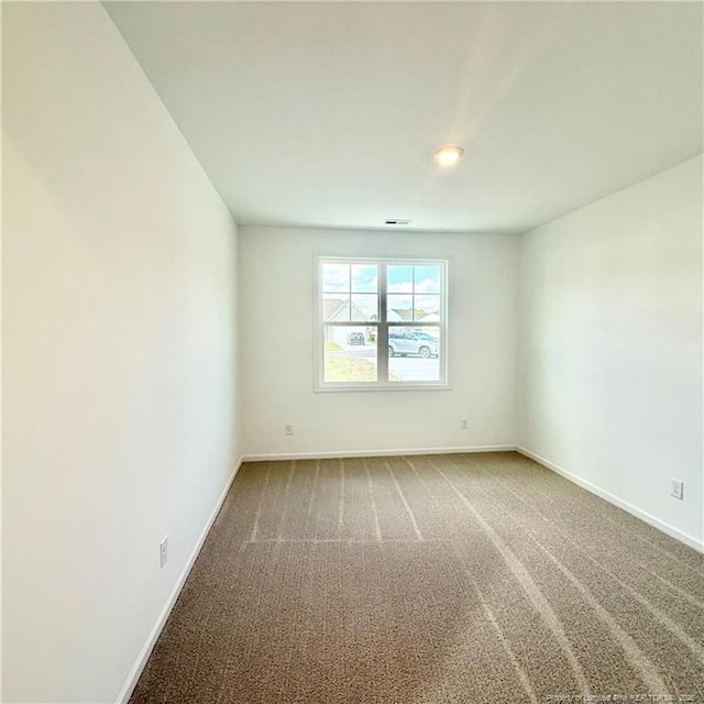 132 Cahill, Home, Raeford, NC 28376 - spare room with carpet floors and baseboards