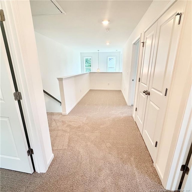 132 Cahill, Home, Raeford, NC 28376 - hall with carpet, an upstairs landing, attic access, and baseboards