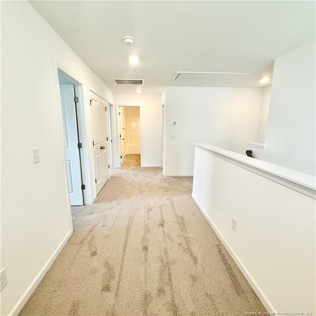 132 Cahill, Home, Raeford, NC 28376 - hall with attic access, light carpet, and baseboards