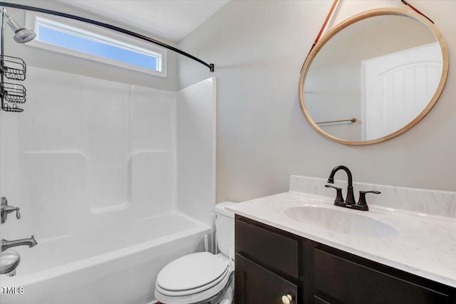 bathroom with toilet, vanity, and shower / bath combination