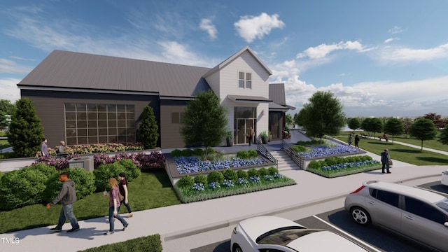 2874 Quarry Rd Unit 165, Rolesville, NC 27571 - view of front of property featuring a metal roof and uncovered parking