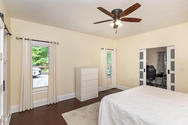 7901 Farnham Ct, Raleigh, NC 27615 - bedroom featuring dark wood-type flooring, baseboards, and ceiling fan
