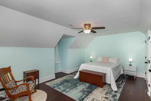 7901 Farnham Ct, Raleigh, NC 27615 - bedroom with dark wood-style flooring, a ceiling fan, baseboards, lofted ceiling, and visible vents