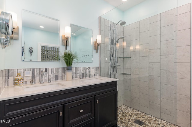 7901 Farnham Ct, Raleigh, NC 27615 - full bath with a sink, a walk in shower, decorative backsplash, and double vanity