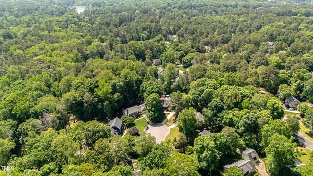 7901 Farnham Ct, Raleigh, NC 27615 - birds eye view of property with a wooded view