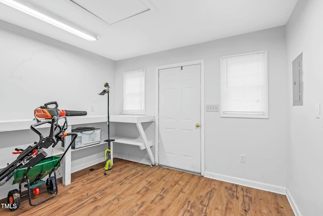 interior space with light wood finished floors and baseboards