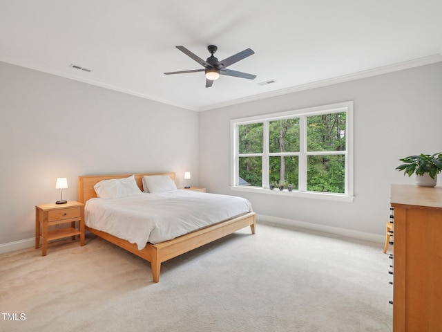 4125 Enfield Ridge Dr, Cary, NC 27519 - bedroom with crown molding, baseboards, light carpet, and a ceiling fan