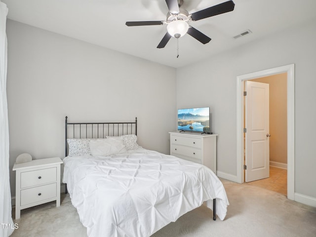 4125 Enfield Ridge Dr, Cary, NC 27519 - bedroom with light colored carpet, a ceiling fan, and baseboards
