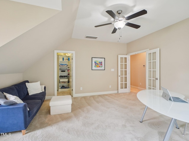 4125 Enfield Ridge Dr, Cary, NC 27519 - living room featuring french doors, light colored carpet, a ceiling fan, vaulted ceiling, and baseboards