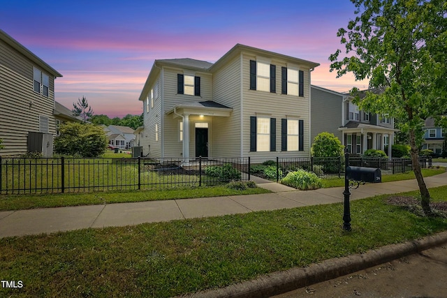 704 Moonbeam Dr, Raleigh, NC 27603 - view of front facade with a fenced front yard
