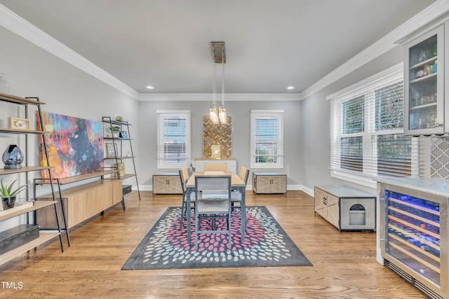 725 S State St, Raleigh, NC 27601 - dining room with wine cooler, recessed lighting, a notable chandelier, and light wood-style flooring