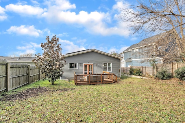 725 S State St, Raleigh, NC 27601 - back of property with a fenced backyard, a yard, and a deck