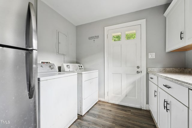 laundry room featuring dark wood-style flooring and washing machine and clothes dryer
