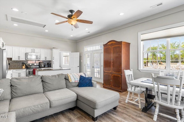 7348 NC-222 Hwy, Stantonsburg, NC 27883 - living area with visible vents, ceiling fan, recessed lighting, and light wood-style floors