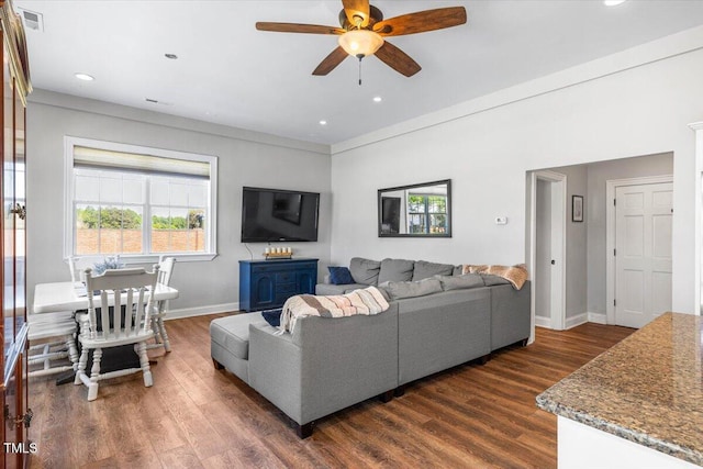 7348 NC-222 Hwy, Stantonsburg, NC 27883 - living room featuring baseboards, visible vents, dark wood-style floors, and ceiling fan