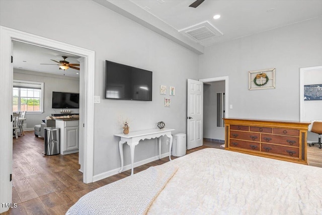 7348 NC-222 Hwy, Stantonsburg, NC 27883 - bedroom featuring a ceiling fan, visible vents, wood finished floors, and baseboards