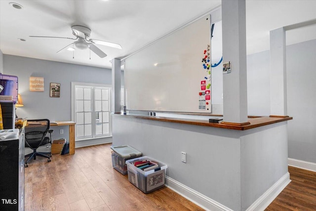 7348 NC-222 Hwy, Stantonsburg, NC 27883 - office area featuring wood finished floors, ceiling fan, and baseboards