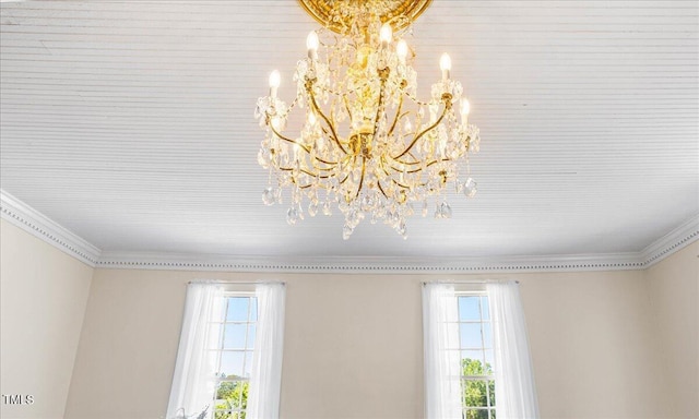 7348 NC-222 Hwy, Stantonsburg, NC 27883 - details with crown molding and an inviting chandelier