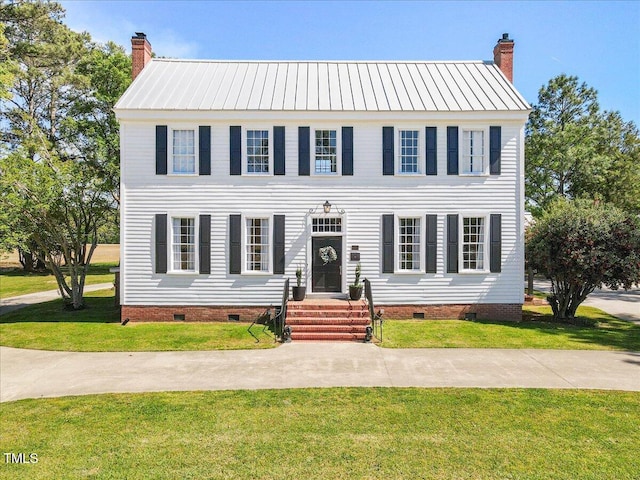 7348 NC-222 Hwy, Stantonsburg, NC 27883 - colonial-style house with a chimney, a front yard, and crawl space