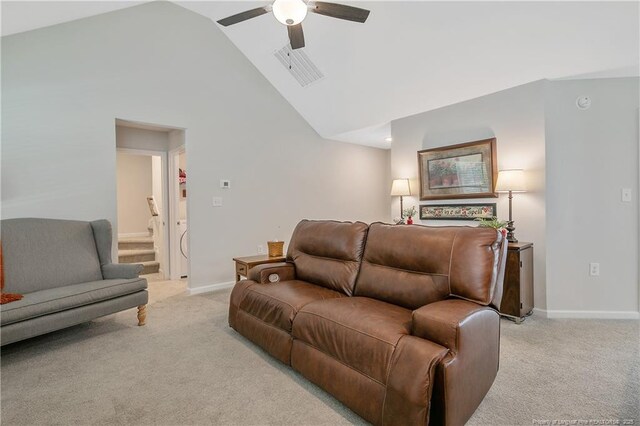 living area with light colored carpet, ceiling fan, baseboards, and visible vents