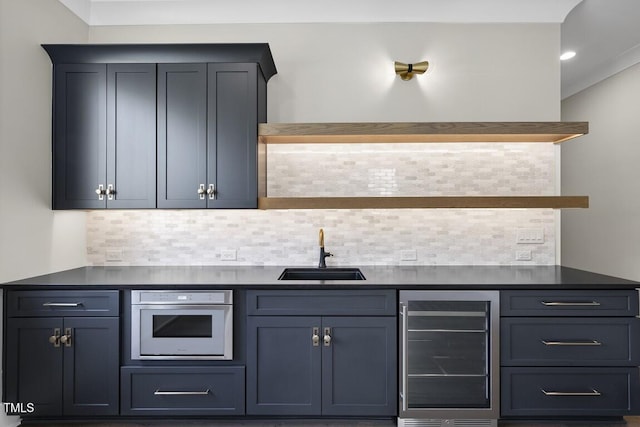bar with wine cooler, a sink, wall oven, and decorative backsplash