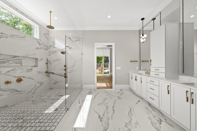 bathroom featuring a marble finish shower, recessed lighting, marble finish floor, and a sink