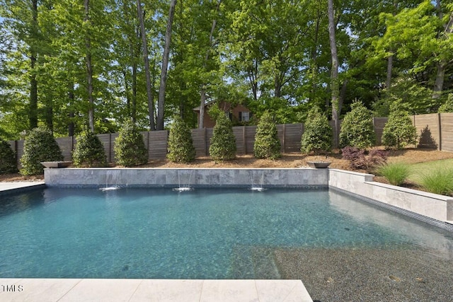 view of swimming pool with a fenced backyard and a fenced in pool