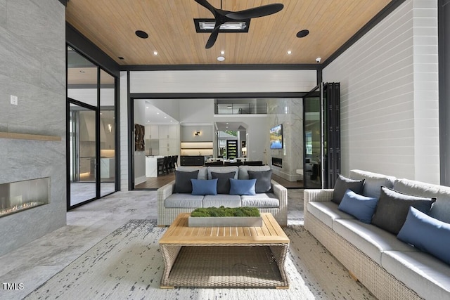 view of patio / terrace featuring an outdoor hangout area and a ceiling fan