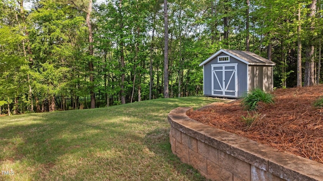 view of yard with an outbuilding and a storage unit