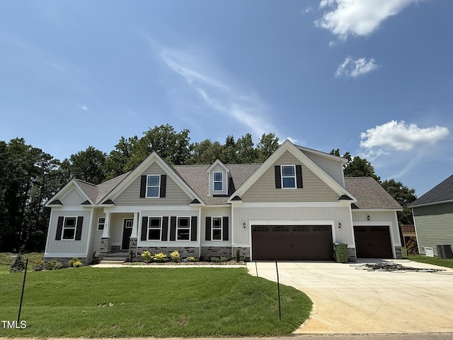 93 Hot Springs Way, Benson, NC 27504 - craftsman-style home featuring a front lawn, driveway, board and batten siding, and a shingled roof