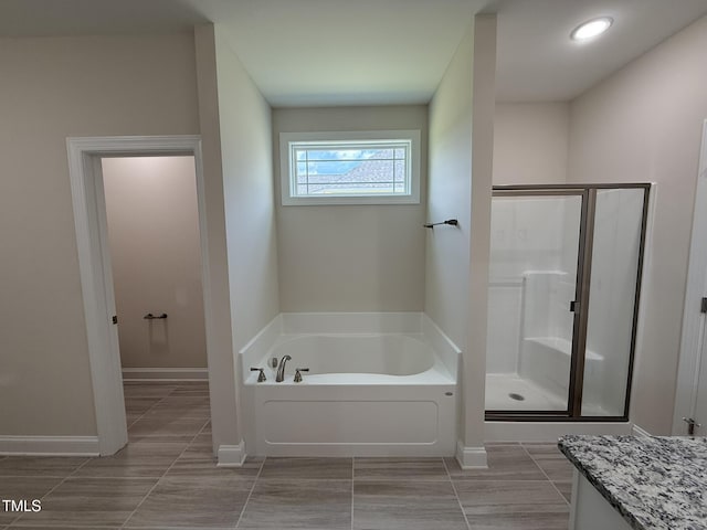 93 Hot Springs Way, Benson, NC 27504 - full bathroom featuring a bath, a shower stall, and vanity