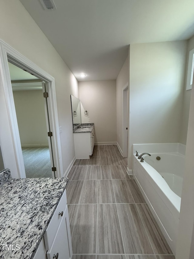 93 Hot Springs Way, Benson, NC 27504 - full bathroom featuring vanity and a garden tub