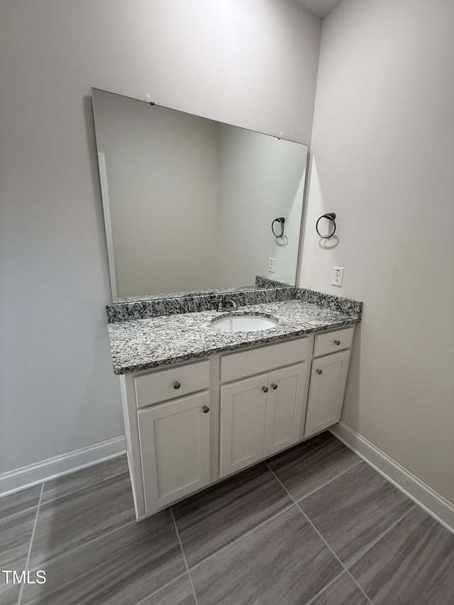 93 Hot Springs Way, Benson, NC 27504 - bathroom with vanity and baseboards