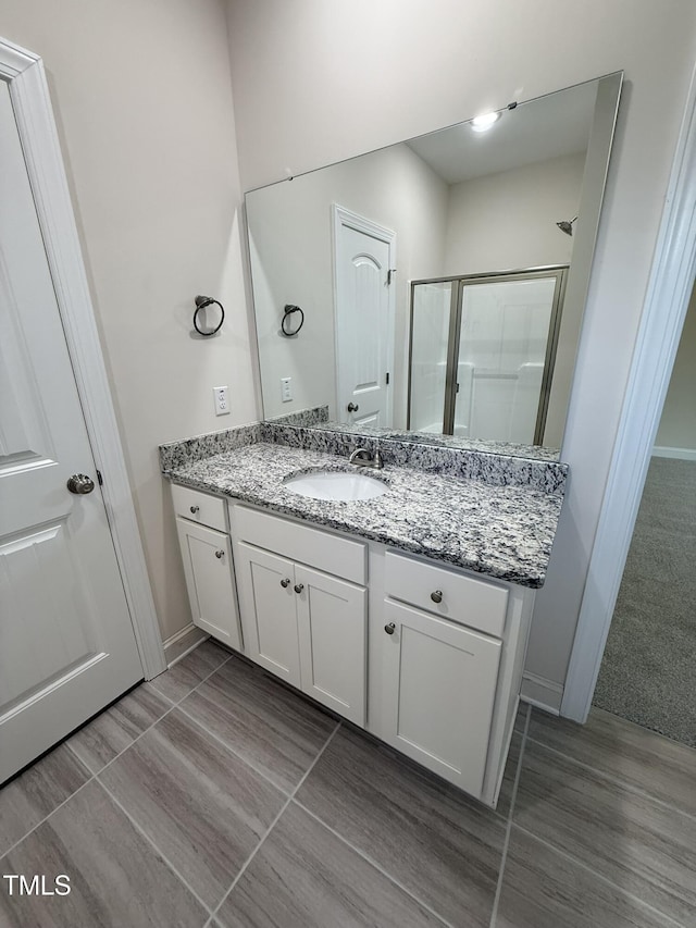 93 Hot Springs Way, Benson, NC 27504 - bathroom with vanity and a shower stall