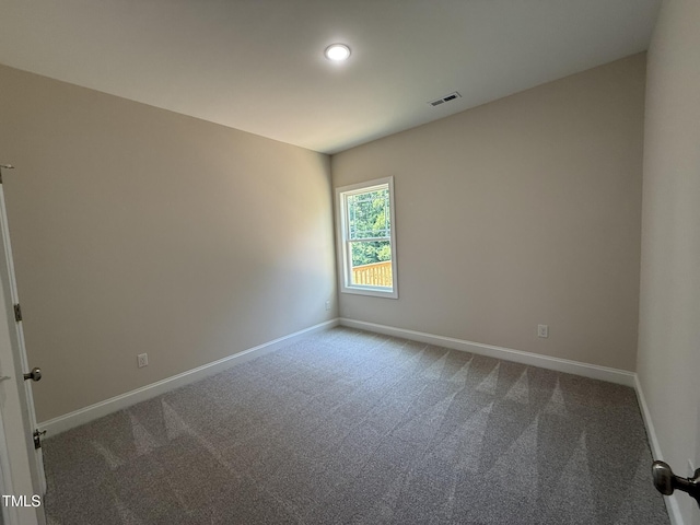 93 Hot Springs Way, Benson, NC 27504 - carpeted spare room featuring baseboards