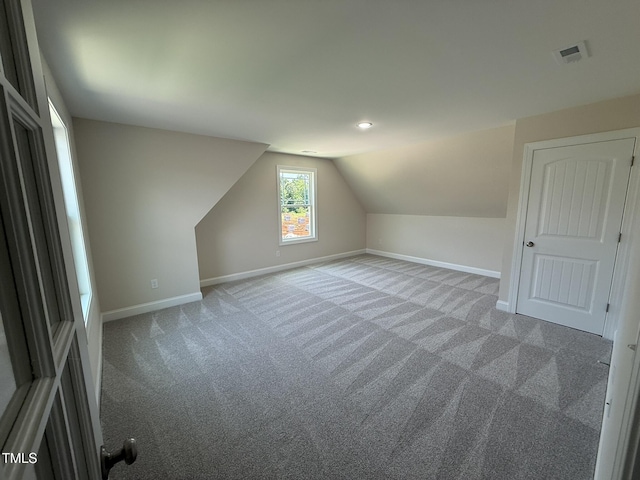 93 Hot Springs Way, Benson, NC 27504 - additional living space with carpet floors, lofted ceiling, and recessed lighting