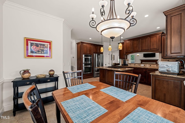 2000 Katesbridge Ln, Raleigh, NC 27614 - dining area featuring a chandelier, ornamental molding, recessed lighting, and light tile patterned floors