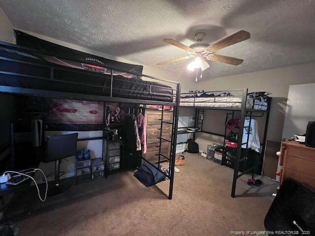 1725 Sand Hill Rd, Hope Mills, NC 28348 - carpeted bedroom featuring a textured ceiling