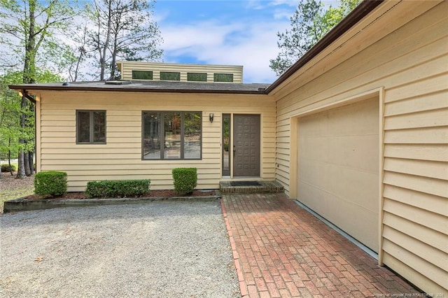 1619 Stonegate N, Sanford, NC 27332 - view of exterior entry with an attached garage