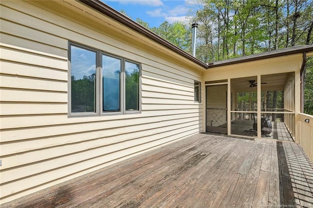 1619 Stonegate N, Sanford, NC 27332 - wooden deck featuring a sunroom and ceiling fan