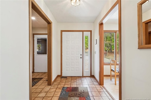 1619 Stonegate N, Sanford, NC 27332 - entrance foyer featuring baseboards and light tile patterned floors