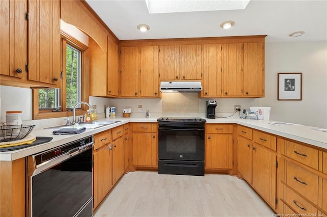 1619 Stonegate N, Sanford, NC 27332 - kitchen featuring under cabinet range hood, light countertops, dishwashing machine, light wood-type flooring, and black electric range oven