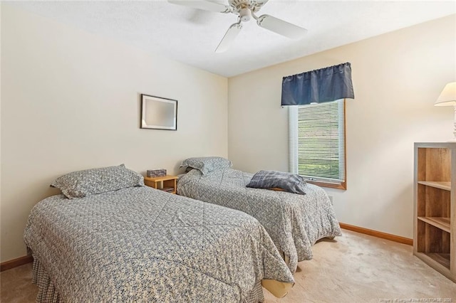 1619 Stonegate N, Sanford, NC 27332 - bedroom with baseboards, a ceiling fan, and light colored carpet