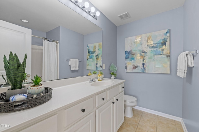 bathroom featuring toilet, tile patterned floors, baseboards, vanity, and a shower with curtain